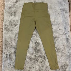14.Buff bunny green leggings with pockets tag worn off some pilling size large